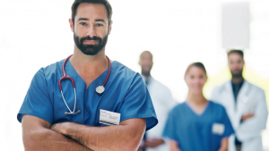 Doctor standing with arms crossed