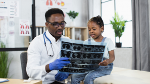 Doctor reviewing x-ray with patient