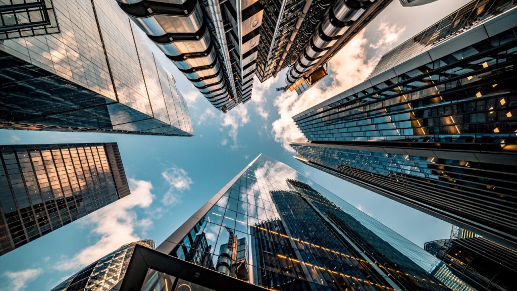 Looking up at skyscrapers