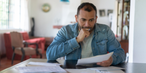 Person reviewing bills