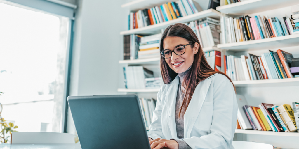 Medical professional working on a computer