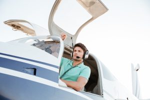Pilot sitting in airplane