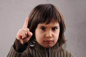 Child wagging finger