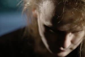 Close up of a person looking down