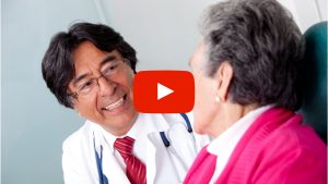 Doctor talking with patient