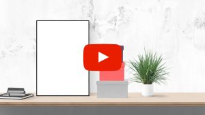 Blank poster sitting on a desk top