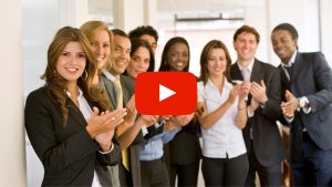 A group of business people clapping