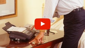 Person using a fax machine