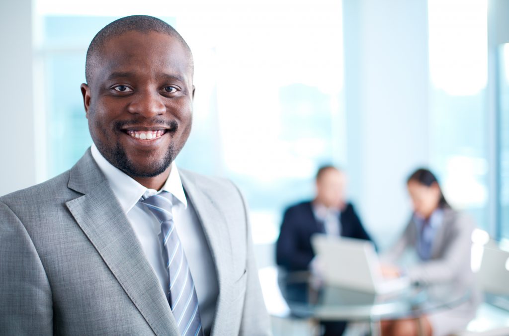 Smiling business person standing