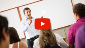 Teacher lecturing to students