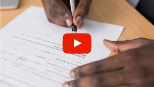 Person signing a form