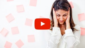 Person holding their head