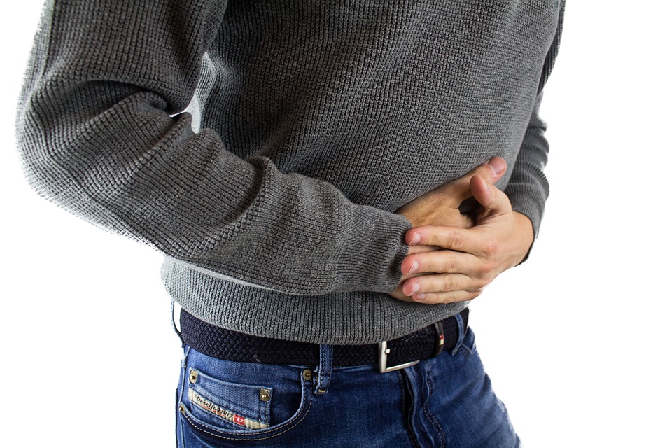 Person holding their stomach