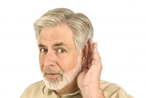Person holding hand up to ear