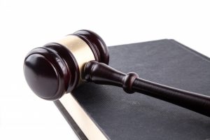 Gavel laying on a book