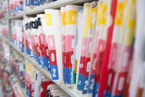 Medical records on a shelf