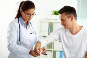 Doctor treating patient
