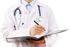 Doctor writing medical note