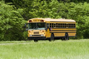 School bus driving down the road