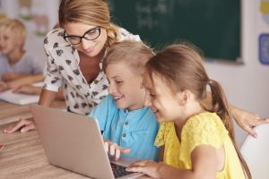 Students using a laptop