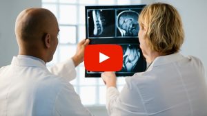 Doctors reviewing radiographic images