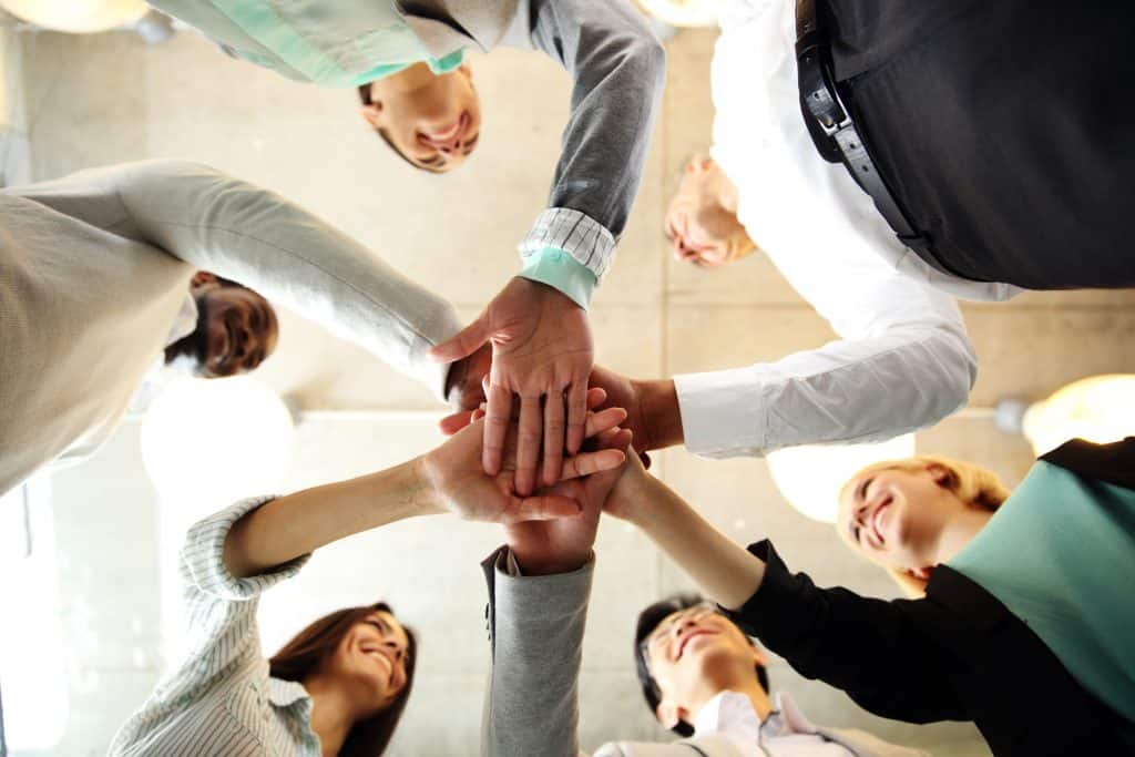 People standing in a huddle