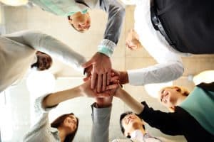People standing in a huddle