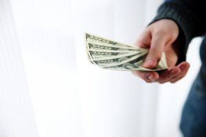 Person holding money