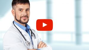 Doctor standing with arms crossed