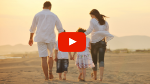 Family walking on the beach