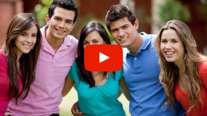 Young people standing and smiling