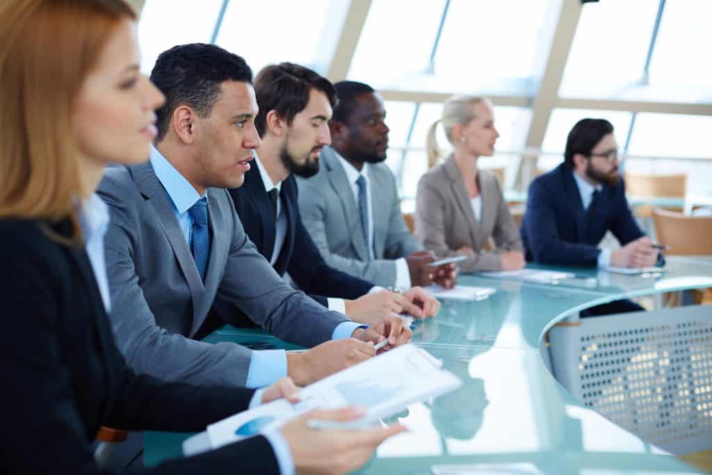 Business people sitting around a table
