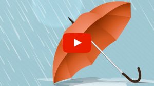Open umbrella sitting on the ground