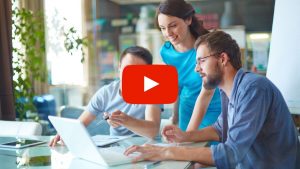 People looking at a computer