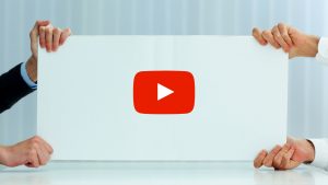 People holding up a blank storyboard