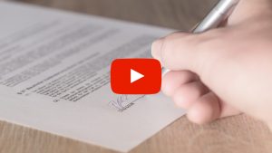 Person signing a form