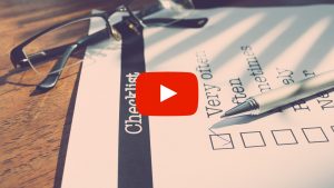 Checklist with a pen laying on it