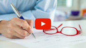 Person filling out a form