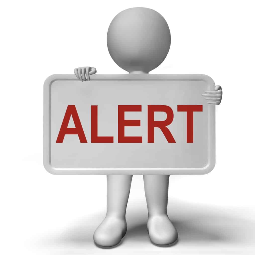 Figure holding an "alert" sign