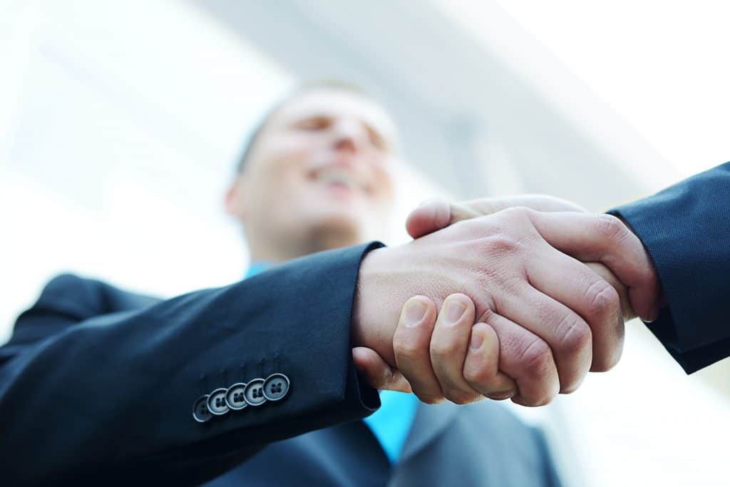 Two people shaking hands