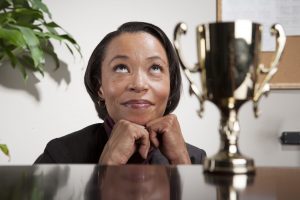 Person looking at a trophy