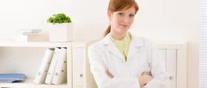 Doctor standing with arms crossed