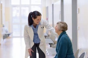 Doctor talking with patient