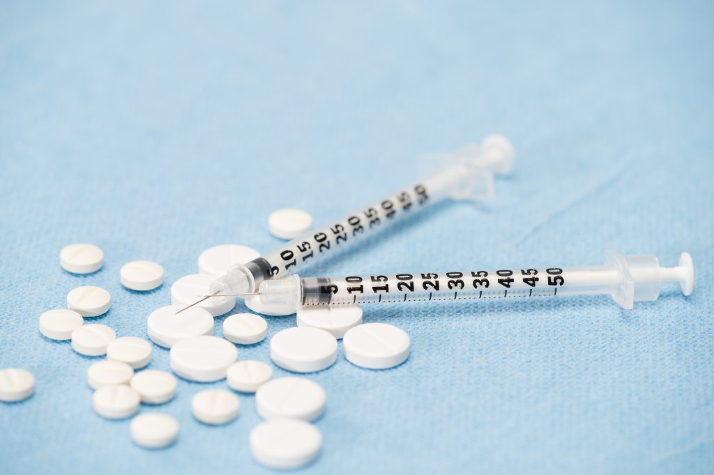 Pills and syringes