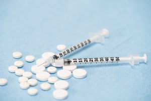 Pills and syringes