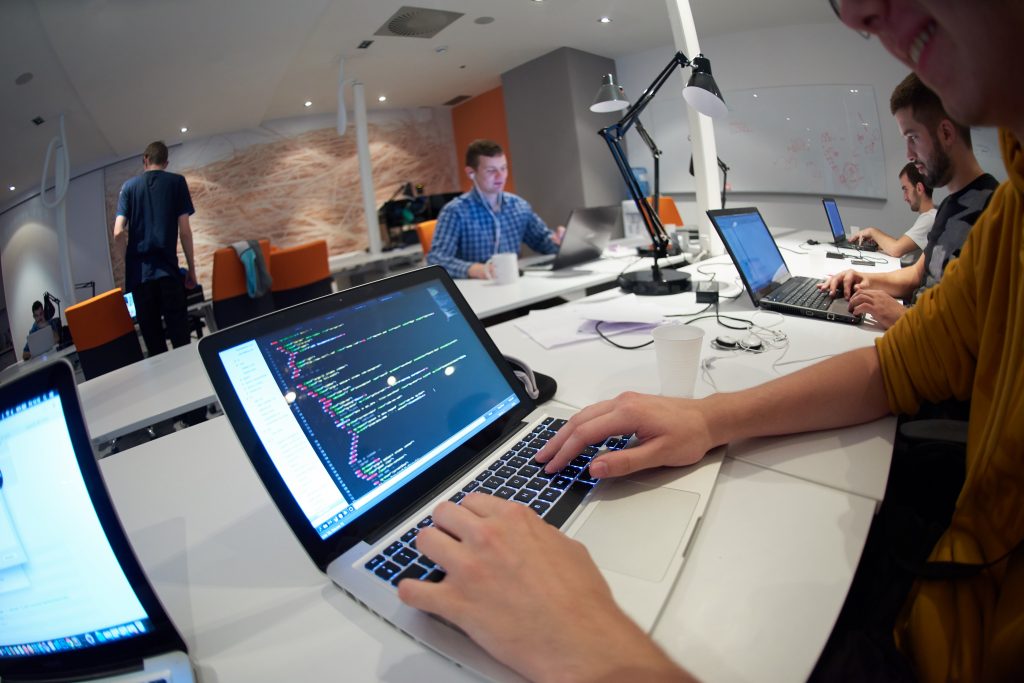 Person reviewing computer code