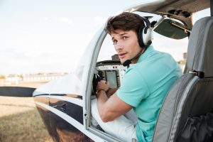 Pilot sitting in airplane