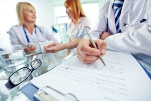 Doctors treating patient