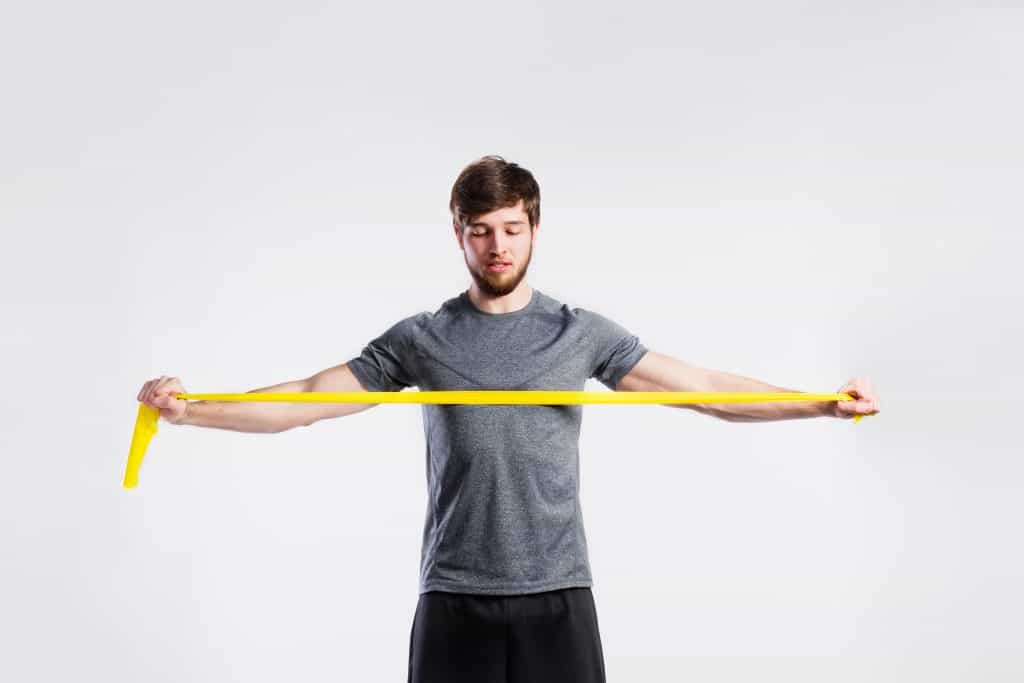 Person exercising with a resistance band