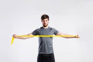 Person exercising with a resistance band